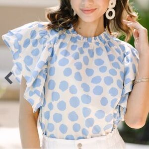 Shop The Mint « Be Your True Self » blue ivory polka dot ruffled sleeve blouse